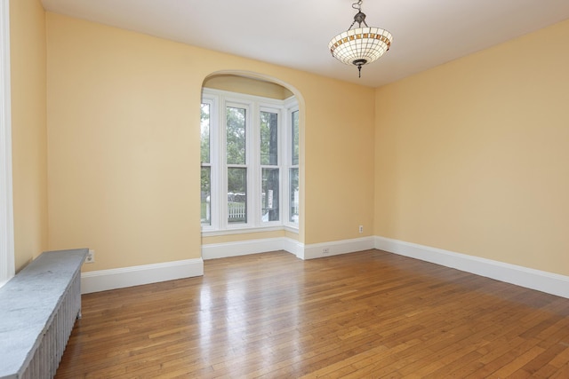 80 Melbourne St, Portland, ME 04101 - spare room with light wood-style flooring and arched walkways