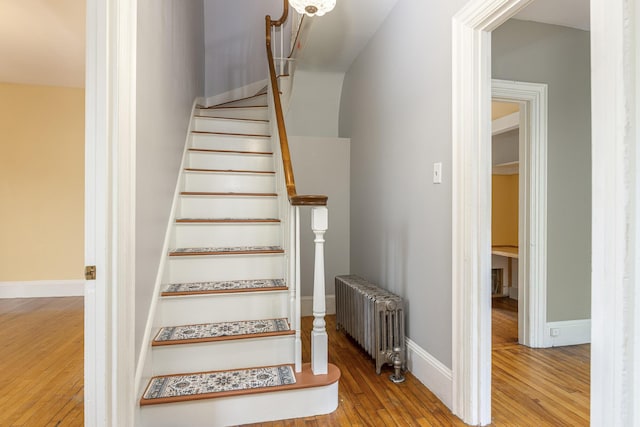 80 Melbourne St, Portland, ME 04101 - stairs featuring radiator heating unit and hardwood / wood-style flooring