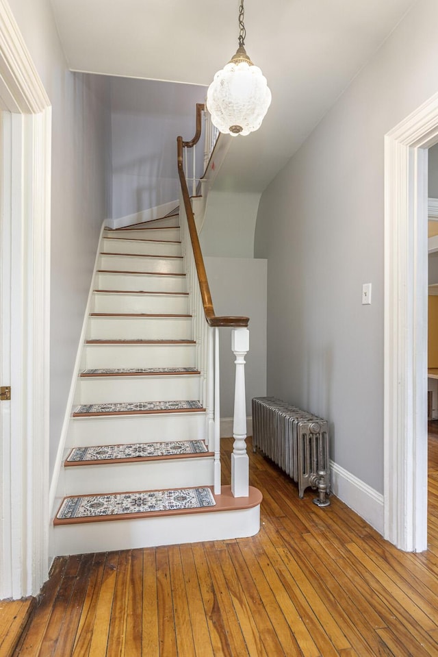 80 Melbourne St, Portland, ME 04101 - stairway with radiator heating unit and hardwood / wood-style floors