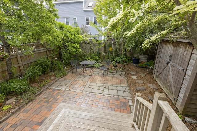 80 Melbourne St, Portland, ME 04101 - fenced backyard featuring a patio area