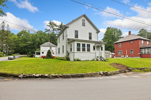 33 Maple St, Limerick, ME 04048 - view of front of home with a front yard