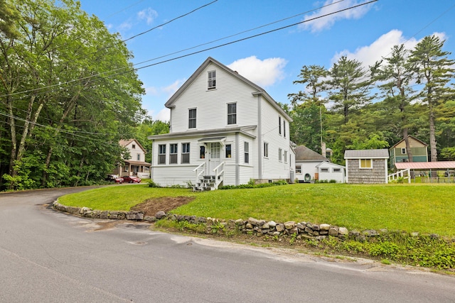 33 Maple St, Limerick, ME 04048 - view of front of house featuring a front lawn