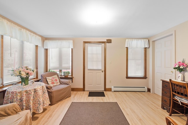33 Maple St, Limerick, ME 04048 - entryway featuring a baseboard heating unit and wood finished floors