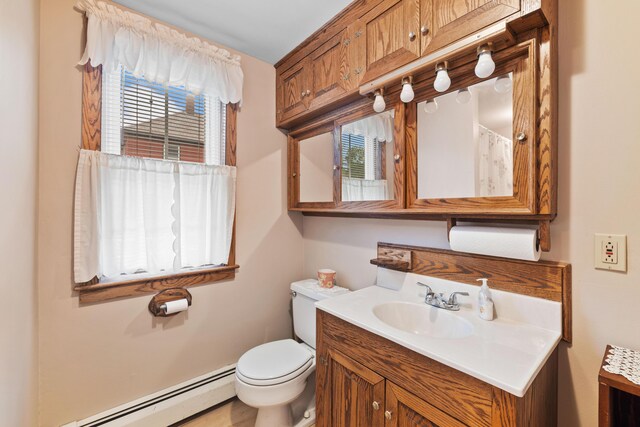33 Maple St, Limerick, ME 04048 - bathroom with a baseboard heating unit and vanity
