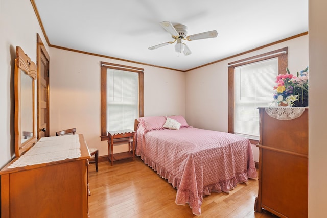 33 Maple St, Limerick, ME 04048 - bedroom featuring crown molding, light wood-style flooring, and ceiling fan