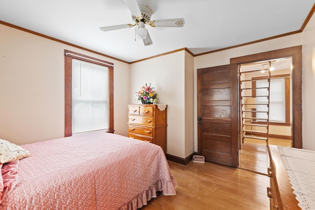 33 Maple St, Limerick, ME 04048 - bedroom featuring light wood-type flooring, ornamental molding, and a ceiling fan