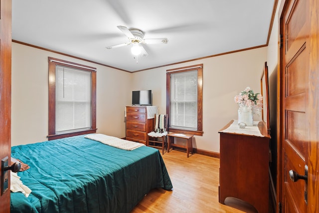 33 Maple St, Limerick, ME 04048 - bedroom with light wood-style flooring, crown molding, and a ceiling fan