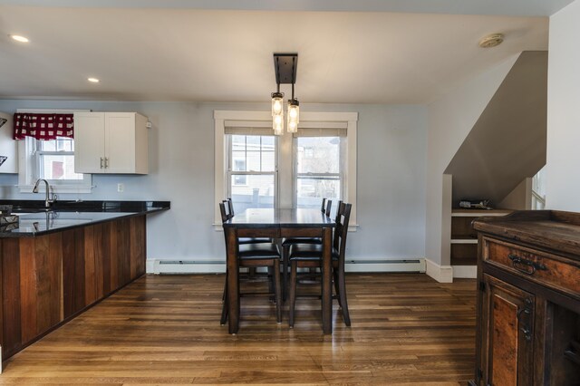 272 Center St, Bangor, ME 04401 - dining space with baseboard heating, dark wood finished floors, and recessed lighting