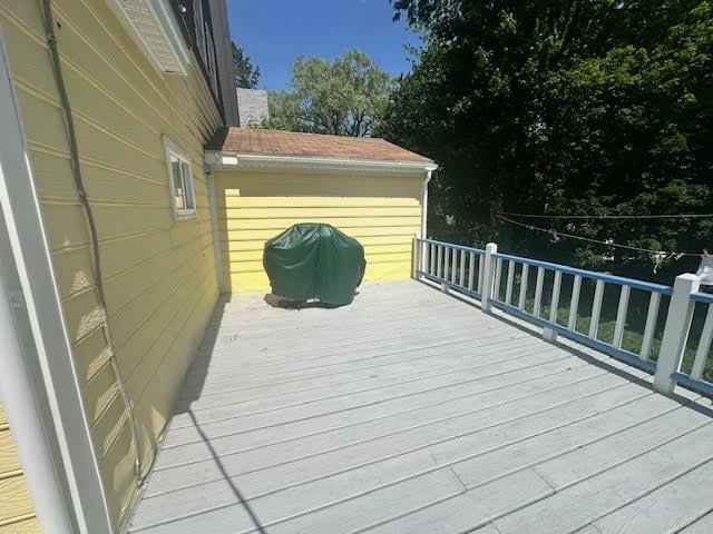 28 Charles St, Belfast, ME 04915 - wooden terrace featuring a grill