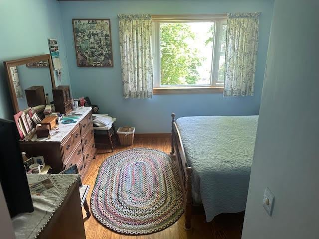 28 Charles St, Belfast, ME 04915 - bedroom featuring light wood-style floors and baseboards