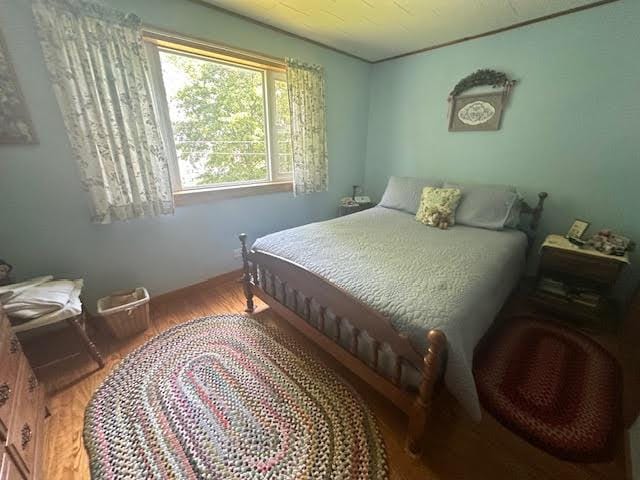 28 Charles St, Belfast, ME 04915 - bedroom featuring wood finished floors