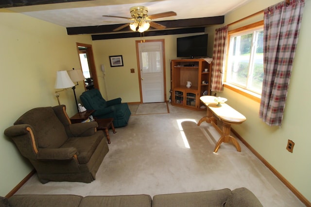 28 Charles St, Belfast, ME 04915 - carpeted living room featuring a ceiling fan and beam ceiling