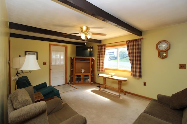 28 Charles St, Belfast, ME 04915 - living room featuring beam ceiling, carpet floors, and a ceiling fan