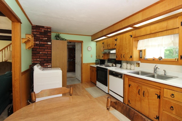 28 Charles St, Belfast, ME 04915 - kitchen featuring white dishwasher, electric stove, washer / dryer, under cabinet range hood, and light countertops