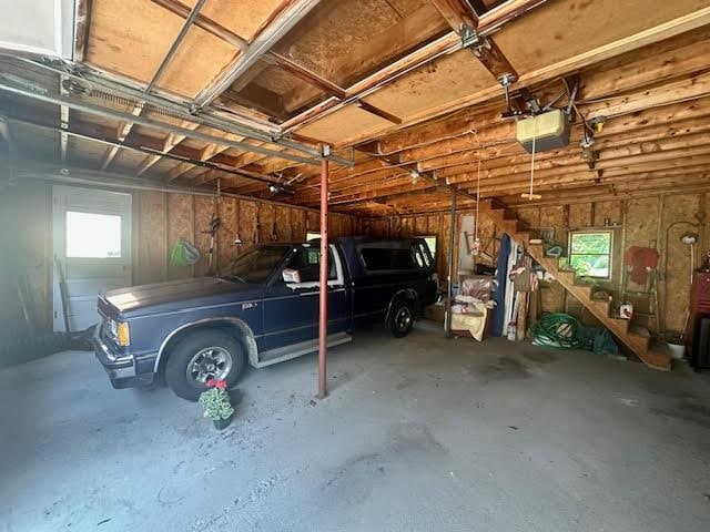 28 Charles St, Belfast, ME 04915 - garage featuring a garage door opener