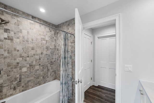 701 Wallston Rd, Saint George, ME 04860 - bathroom with shower / tub combo with curtain, wood finished floors, vanity, and recessed lighting