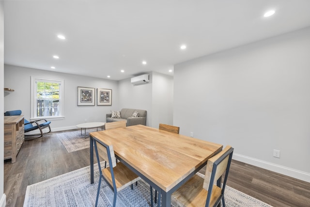 701 Wallston Rd, Saint George, ME 04860 - dining area with a wall mounted AC, dark wood-style floors, and recessed lighting