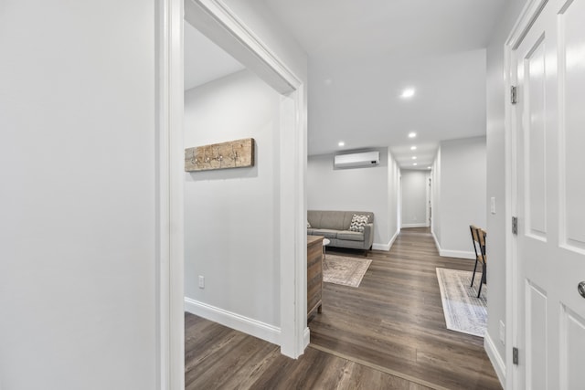 701 Wallston Rd, Saint George, ME 04860 - hallway with an AC wall unit, dark wood-style floors, and recessed lighting