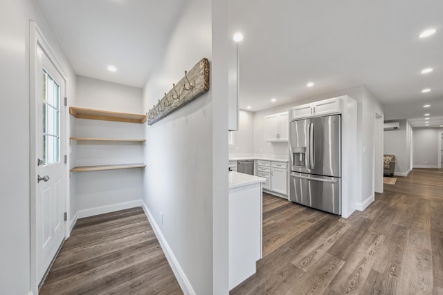 701 Wallston Rd, Saint George, ME 04860 - interior space with a wall mounted air conditioner, recessed lighting, and dark wood-style floors