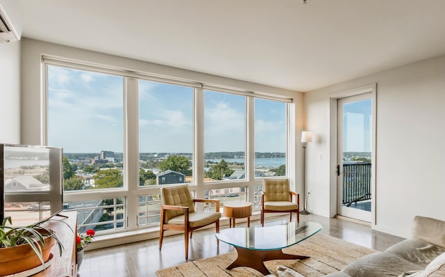 156 Sheridan St Unit 2A, Portland, ME 04101 - sunroom / solarium with an AC wall unit