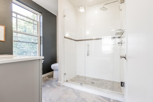 156 Sheridan St Unit 2A, Portland, ME 04101 - full bath with a shower stall, marble look tiles, and vanity
