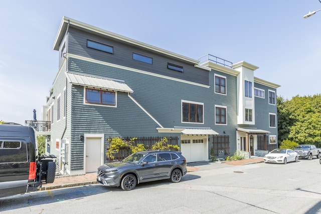 156 Sheridan St Unit 2A, Portland, ME 04101 - view of front facade featuring an attached garage