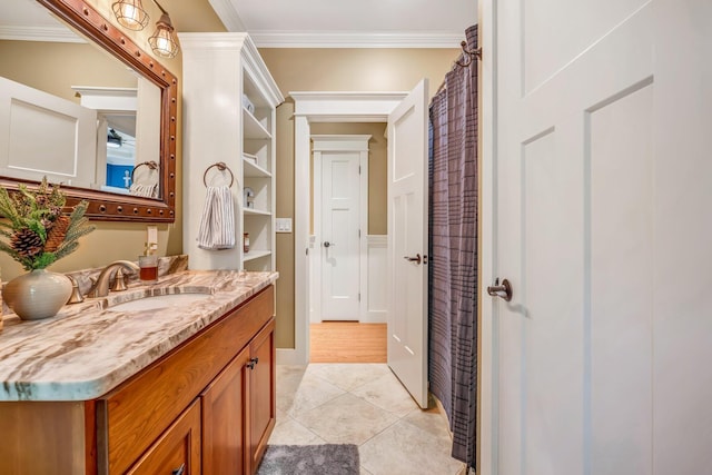 187 Hickory Dr, Auburn, ME 04210 - full bath featuring crown molding, vanity, and tile patterned floors