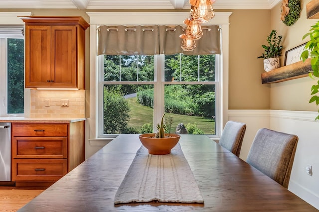 187 Hickory Dr, Auburn, ME 04210 - dining area with crown molding and light wood finished floors