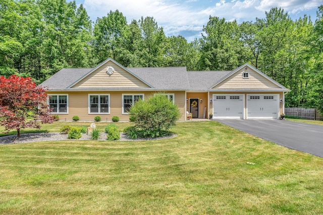 187 Hickory Dr, Auburn, ME 04210 - single story home featuring an attached garage, asphalt driveway, and a shingled roof