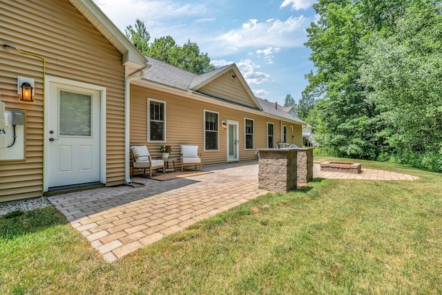 187 Hickory Dr, Auburn, ME 04210 - view of grassy yard with a patio and an outdoor fire pit