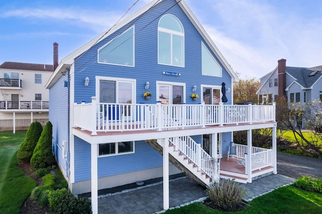 204 Nubble Rd, York, ME 03909 - rear view of house with a patio and a deck