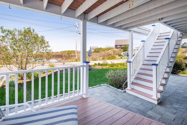 204 Nubble Rd, York, ME 03909 - deck featuring stairs, a yard, and a water view