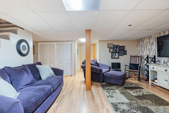 15 Lindale Ave, Biddeford, ME 04005 - living area featuring a paneled ceiling and light wood-style flooring