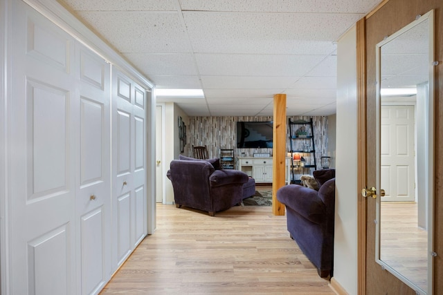 15 Lindale Ave, Biddeford, ME 04005 - living area with light wood-style flooring and a paneled ceiling
