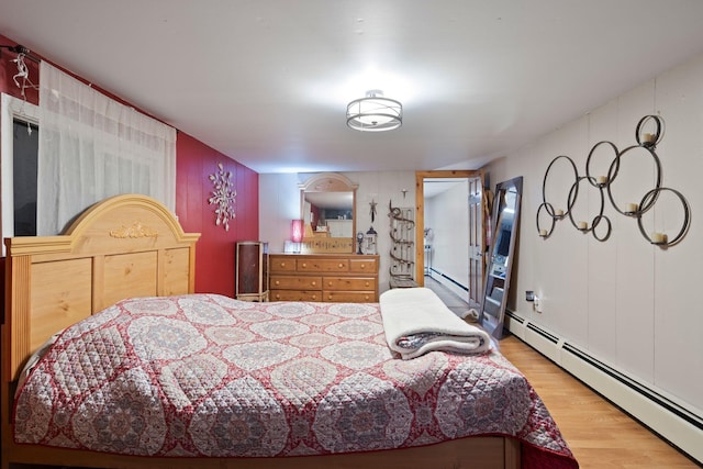15 Lindale Ave, Biddeford, ME 04005 - bedroom with a baseboard heating unit and wood finished floors