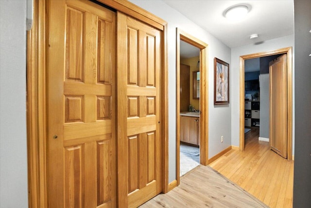 189 Old Chadbourne Rd, Lewiston, ME 04240 - hallway with light wood-style flooring and baseboards