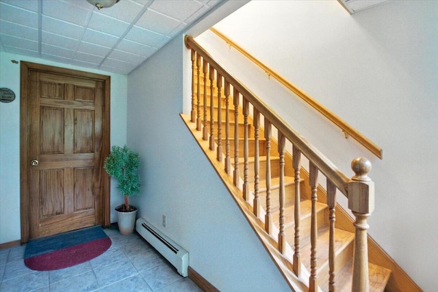 189 Old Chadbourne Rd, Lewiston, ME 04240 - staircase with baseboard heating and tile patterned floors