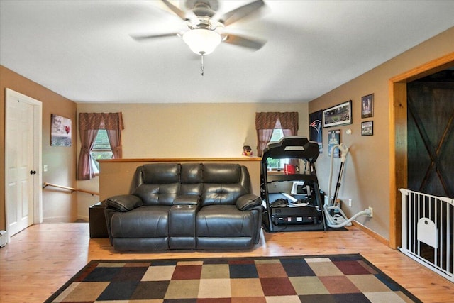 189 Old Chadbourne Rd, Lewiston, ME 04240 - living area with wood finished floors and ceiling fan
