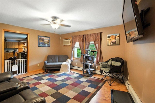189 Old Chadbourne Rd, Lewiston, ME 04240 - living area with a ceiling fan, wood finished floors, and an AC wall unit