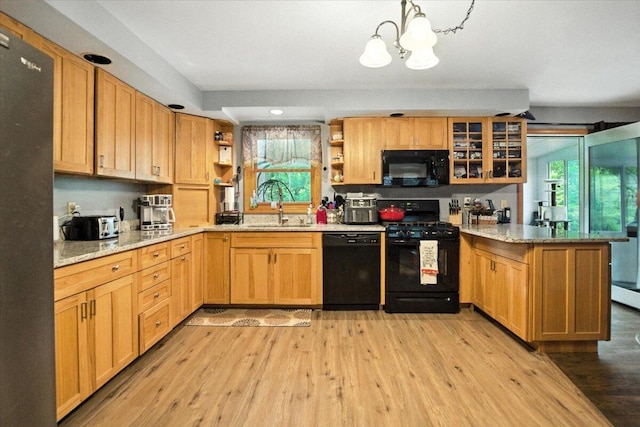 189 Old Chadbourne Rd, Lewiston, ME 04240 - kitchen featuring black appliances, a peninsula, open shelves, healthy amount of natural light, and recessed lighting