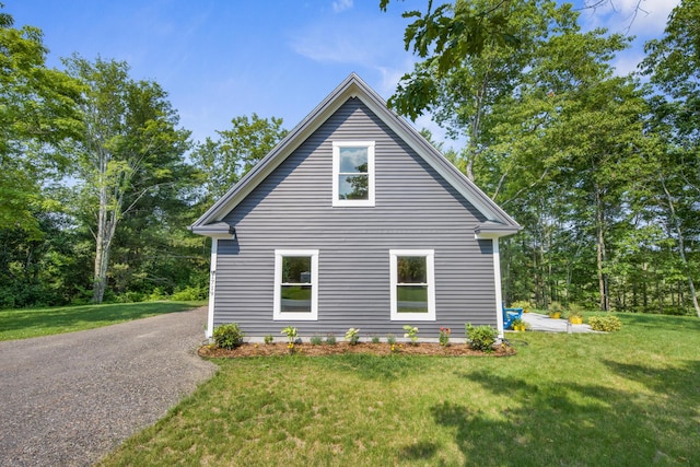 1719 Dixmont Rd, Etna, ME 04434 - view of side of property featuring a yard