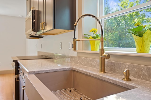 1719 Dixmont Rd, Etna, ME 04434 - kitchen view of stainless steel appliances and light stone counters