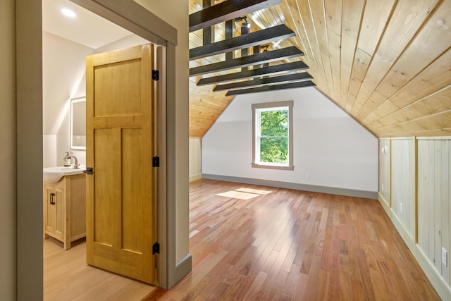1719 Dixmont Rd, Etna, ME 04434 - additional living space with light wood finished floors and wood ceiling