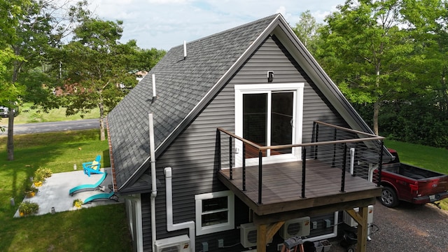 1719 Dixmont Rd, Etna, ME 04434 - back of house featuring roof with shingles and a yard