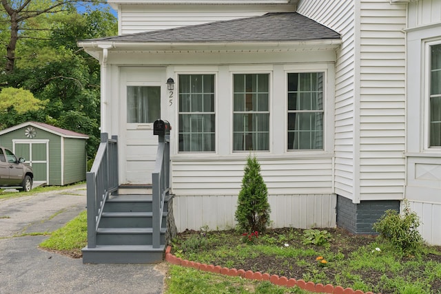 25 Searles St, Livermore Falls, ME 04254 - doorway to property with a shingled roof