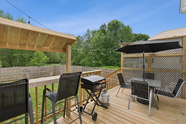 25 Searles St, Livermore Falls, ME 04254 - deck with outdoor dining space and grilling area