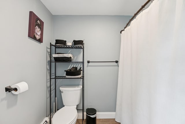 25 Searles St, Livermore Falls, ME 04254 - bathroom with wood finished floors and curtained shower