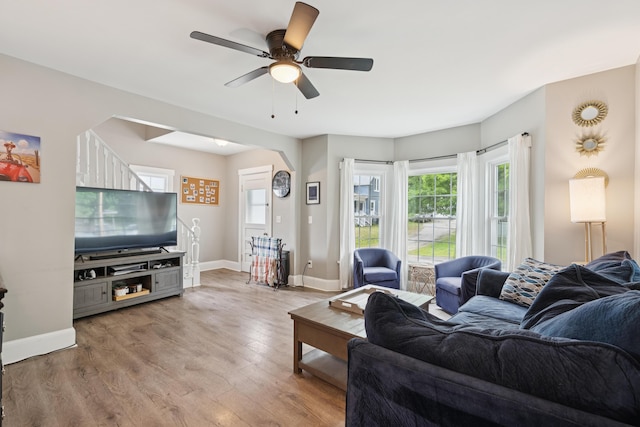 25 Searles St, Livermore Falls, ME 04254 - living area featuring light wood-type flooring and ceiling fan
