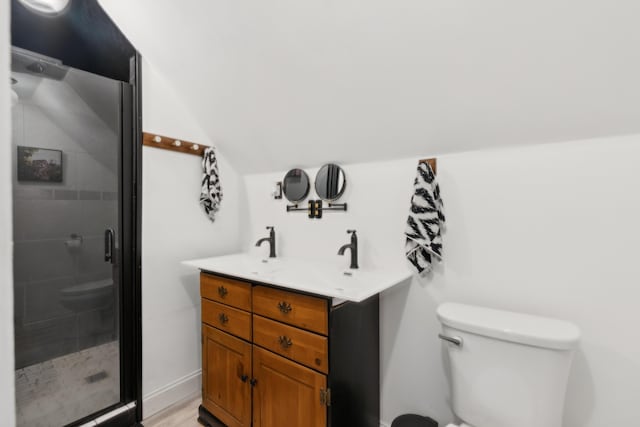 25 Searles St, Livermore Falls, ME 04254 - bathroom featuring a shower stall, double vanity, and vaulted ceiling
