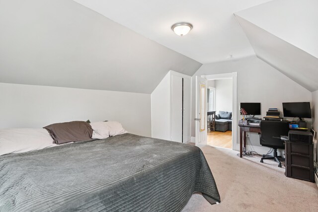 25 Searles St, Livermore Falls, ME 04254 - carpeted bedroom with a desk and vaulted ceiling